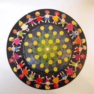 Karen K Højt fra træets grønne top